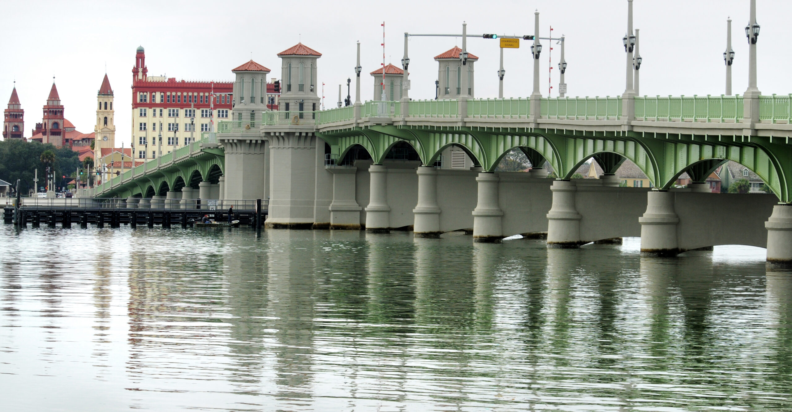 A bridge with still water